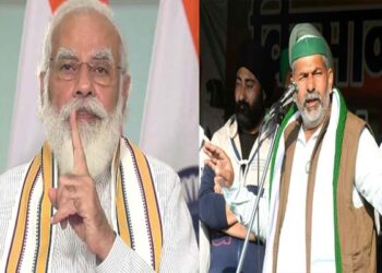 PM Modi and Rakesh Tikait